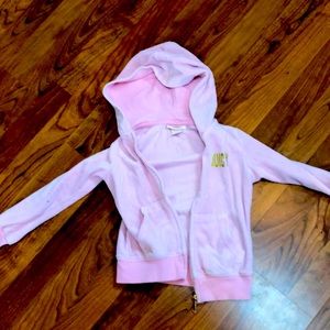 Girls Pink Juicy Couture size 5 zip up hoodie jacket with pockets. Detailed.